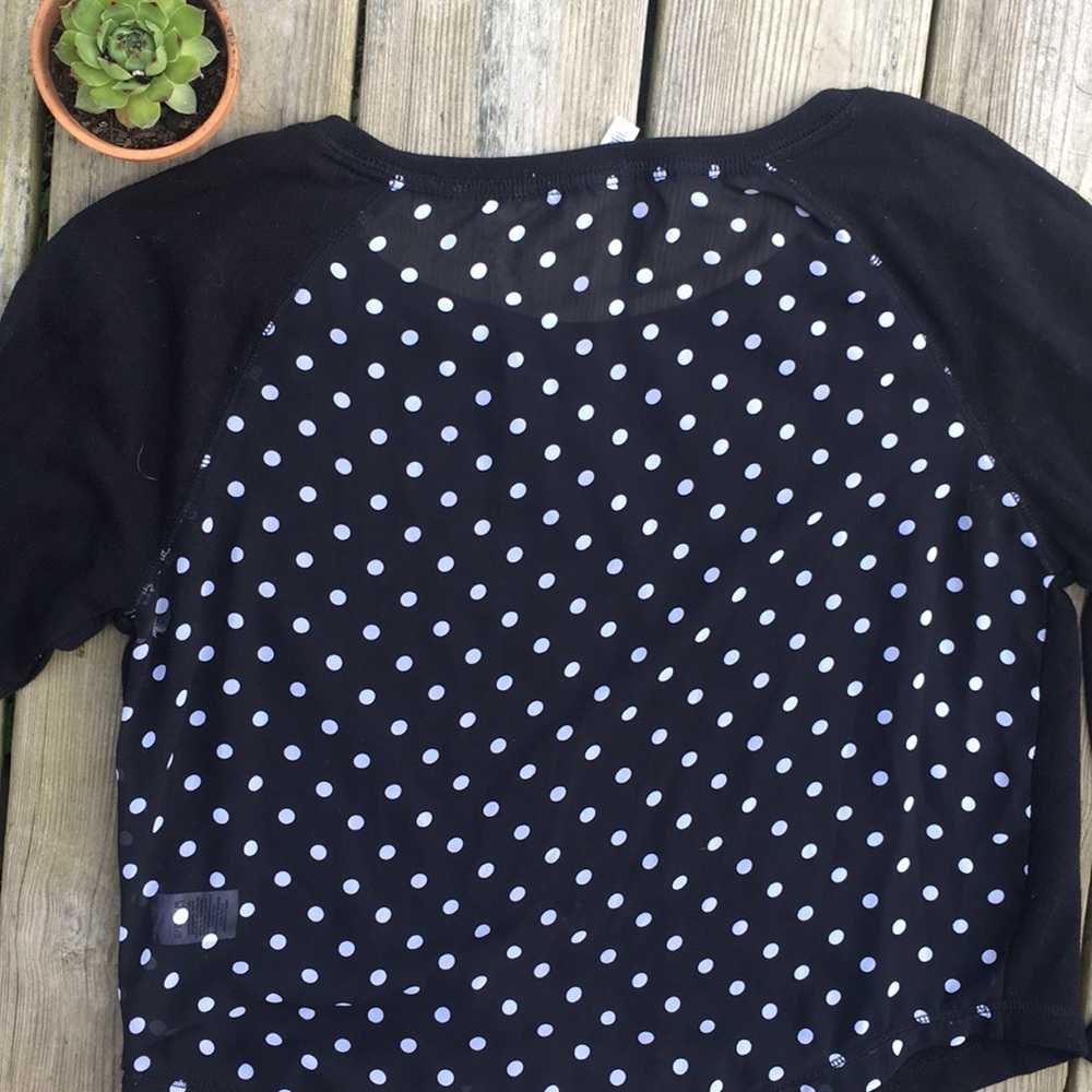 Black polka dot shirt with sheer back